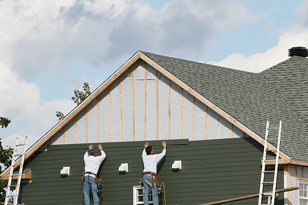 Professional Emergency Siding Repair technician working in Dendron, VA